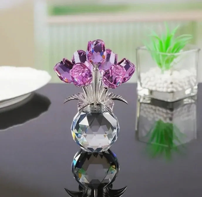 Handcrafted geometric rose ornament made from coloured K9 crystal glass on a neutral background.