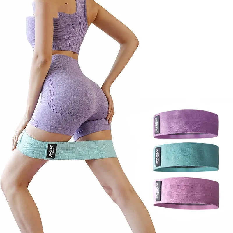 Polyester cotton resistance band in pink, green, or purple, sizes M 66cm, L 76cm, XL 86cm, with small medium large resistance.