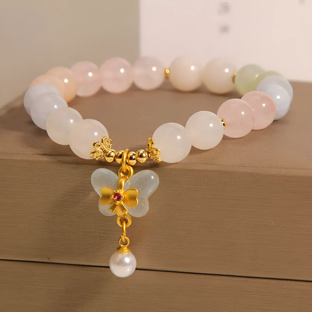 Women's bracelet with colourful Morganite butterfly pendant and crystal links.