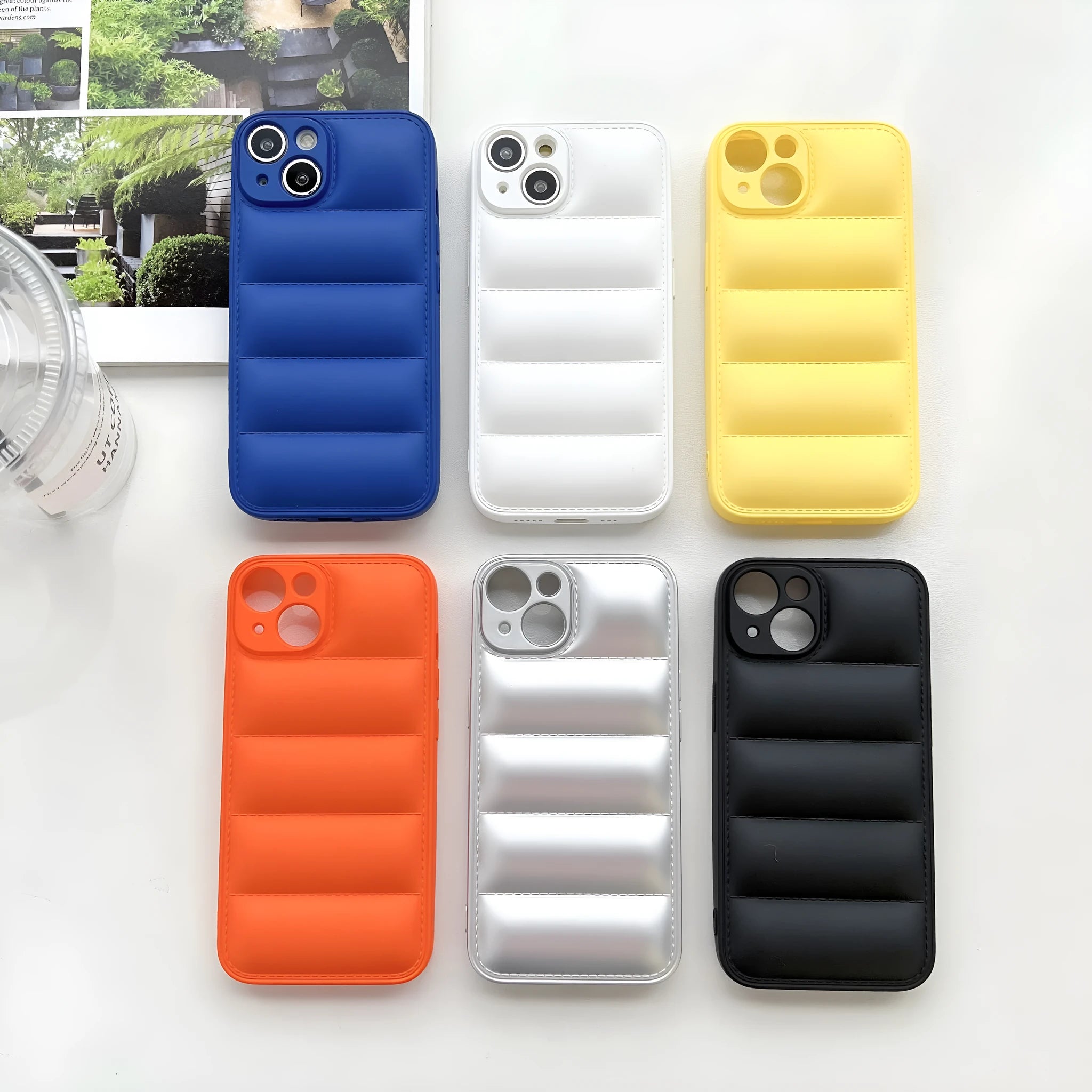 Plastic down jacket phone case for iPhone 15 series in black, shockproof TPU back cover