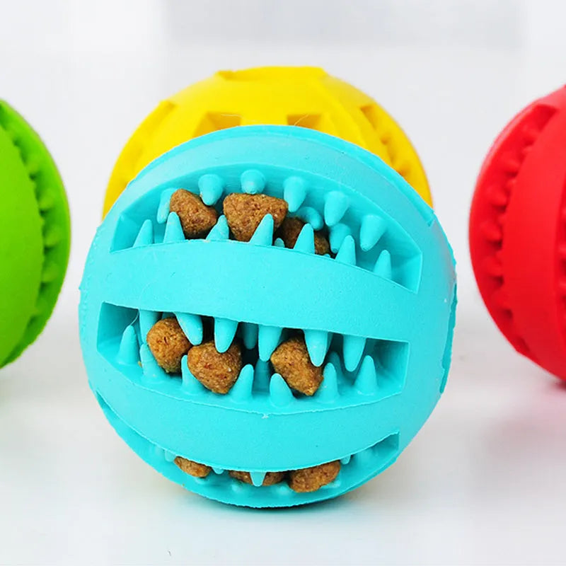 Rubber dog ball toy in blue green red for treat dispensing, slow feeding and tooth cleaning, 5cm and 7cm
