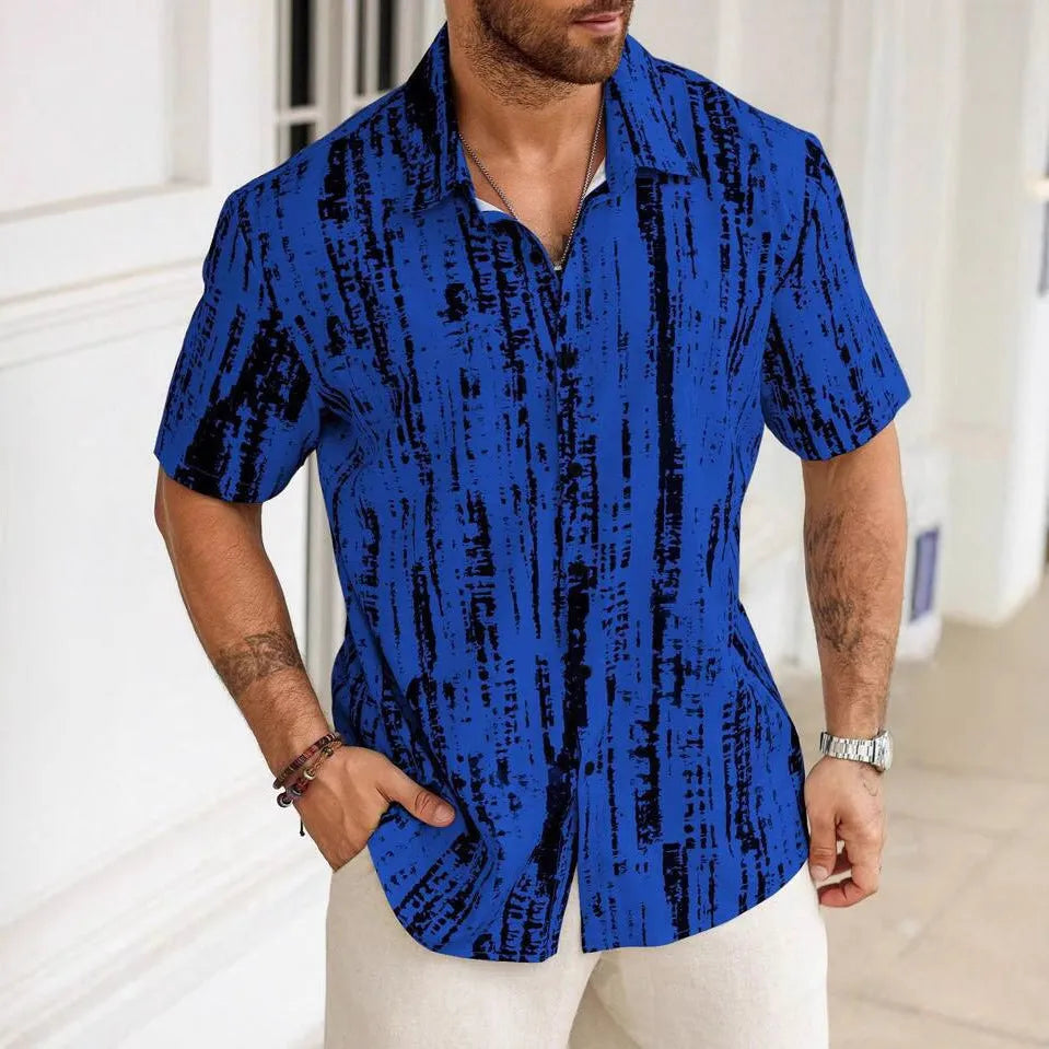 Man wearing a short sleeve striped casual shirt in blue, showing 3D print detail and lightweight fabric.