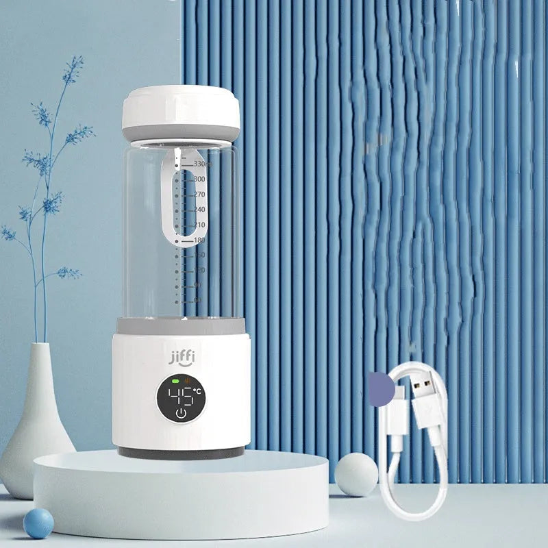 Wireless portable milk warmer in white with 350ml capacity and 316L stainless steel inner container