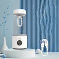 Wireless portable milk warmer in white with 350ml capacity and 316L stainless steel inner container
