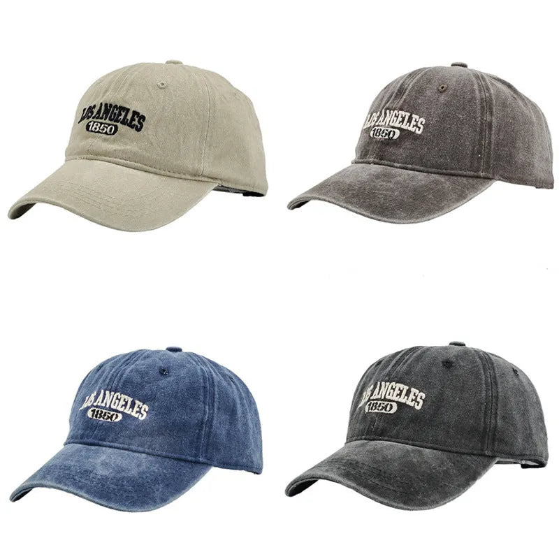 Retro-style personalised embroidered peaked cap with adjustable strap on distressed beige fabric.