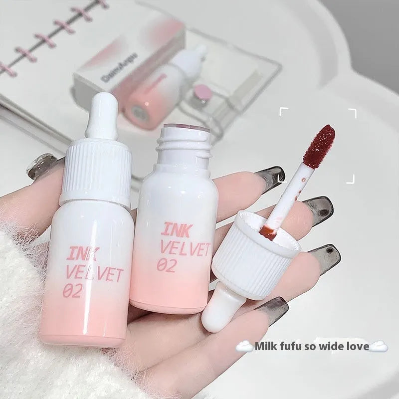 Mirror Lip Lacquer tube in moisturising formula with non-stick cup finish showing four colour options