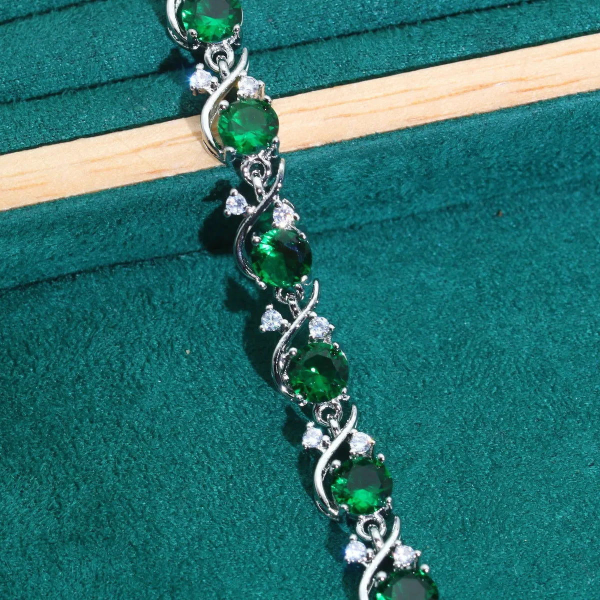 Copper inlaid AAA zircon bracelet with golden leaf design and electroplated finish