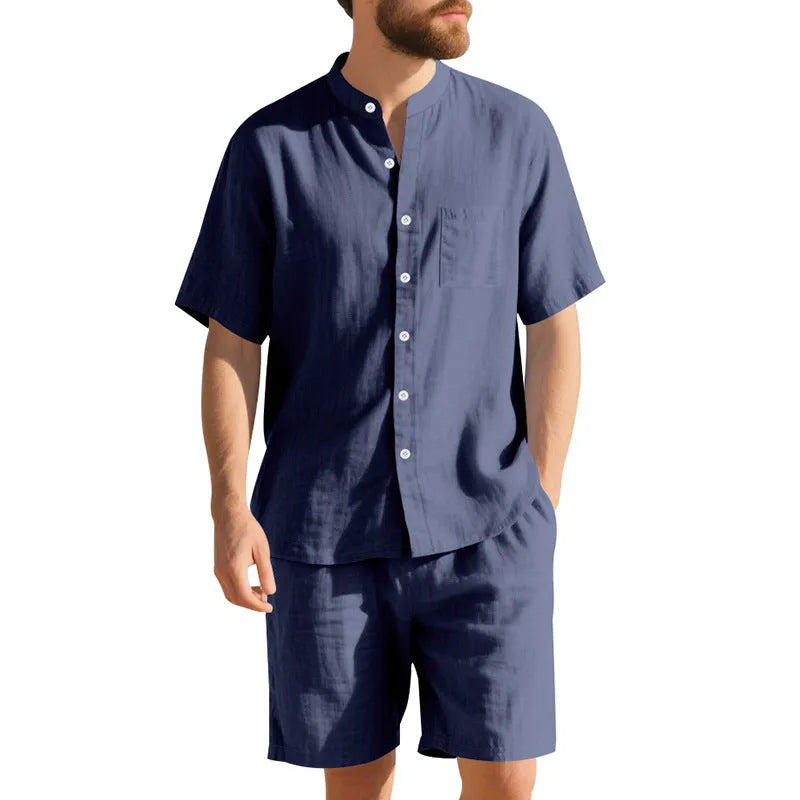 Men's light blue linen blend summer suit with henry collar shirt and shorts on a hanger.