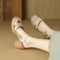 Women's open toe platform sandals in apricot with a round toe holder and a thick light-brown rubber sole.