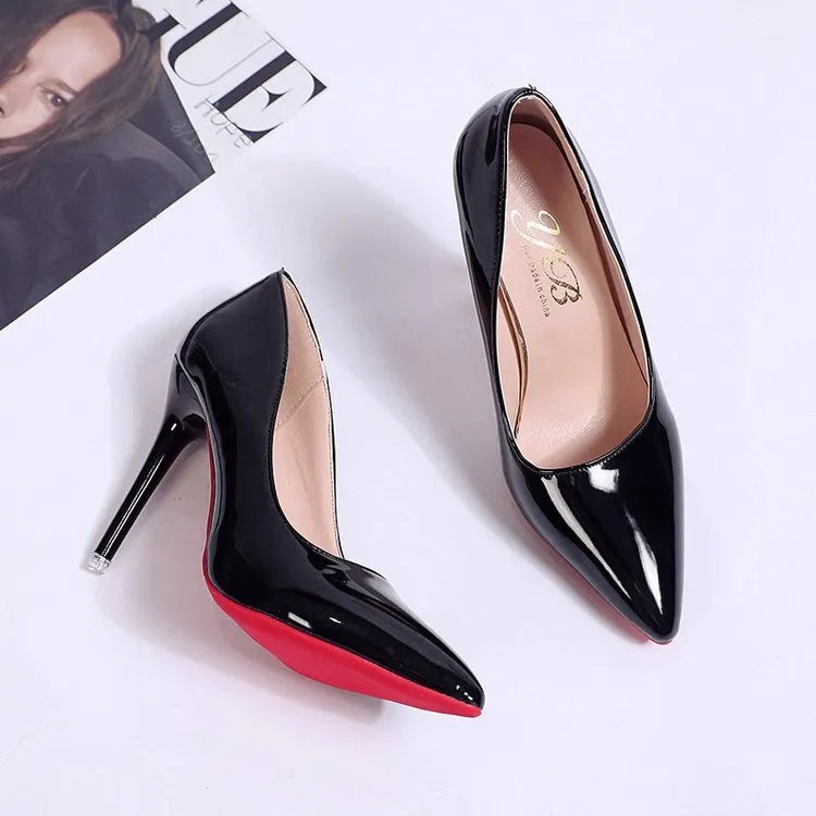 Women's pointed toe stiletto pump in a solid colour, showing the shallow mouth and high heel.