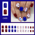 Short glossy false nails with red and blue strawberry cherry pattern, 24 piece set.