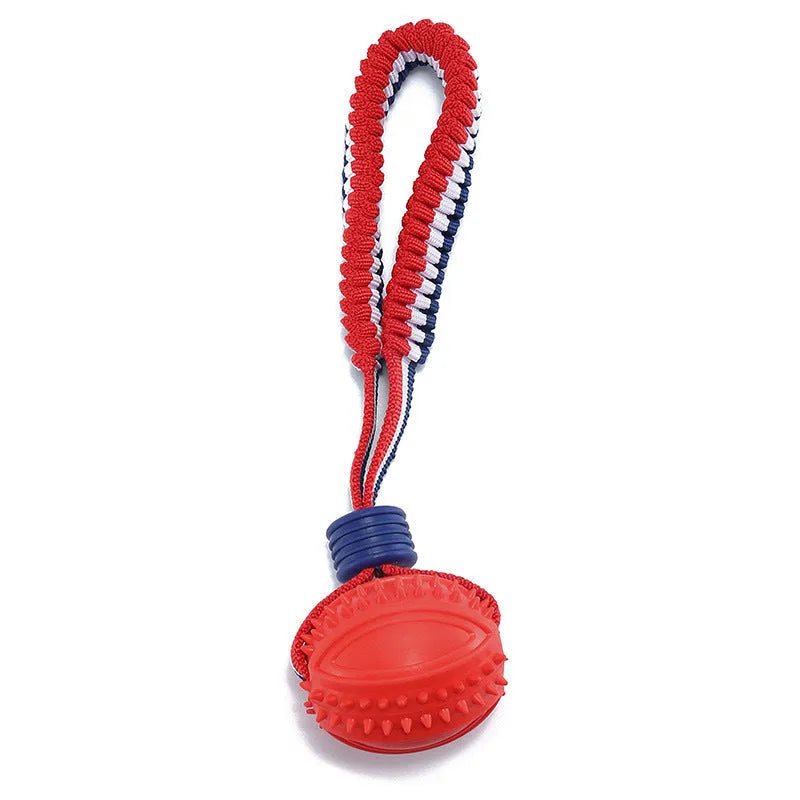 Blue dog ball with attached rope, showing textured surface and total length of 29 cm.