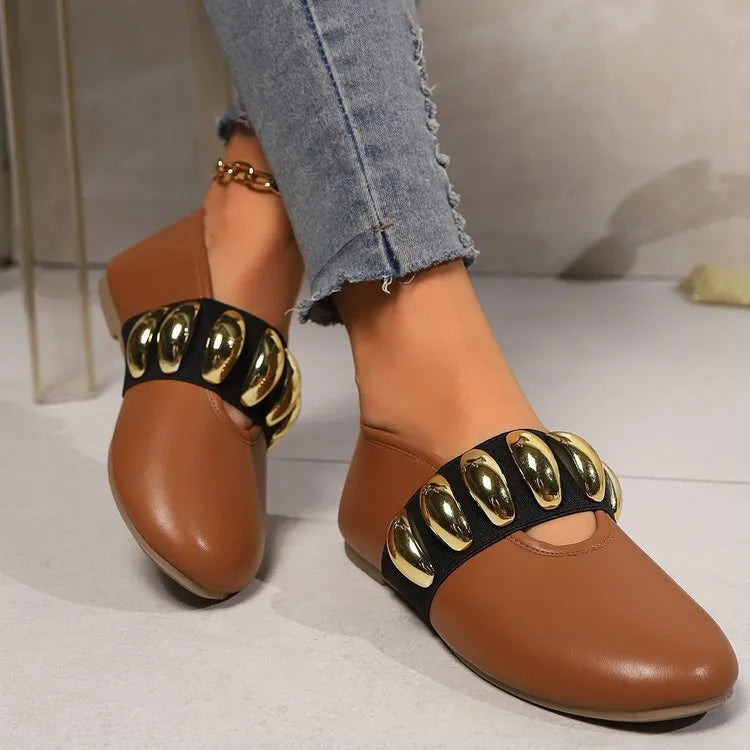 Brown artificial PU flat loafers for women with metal buckle and round toe, side view