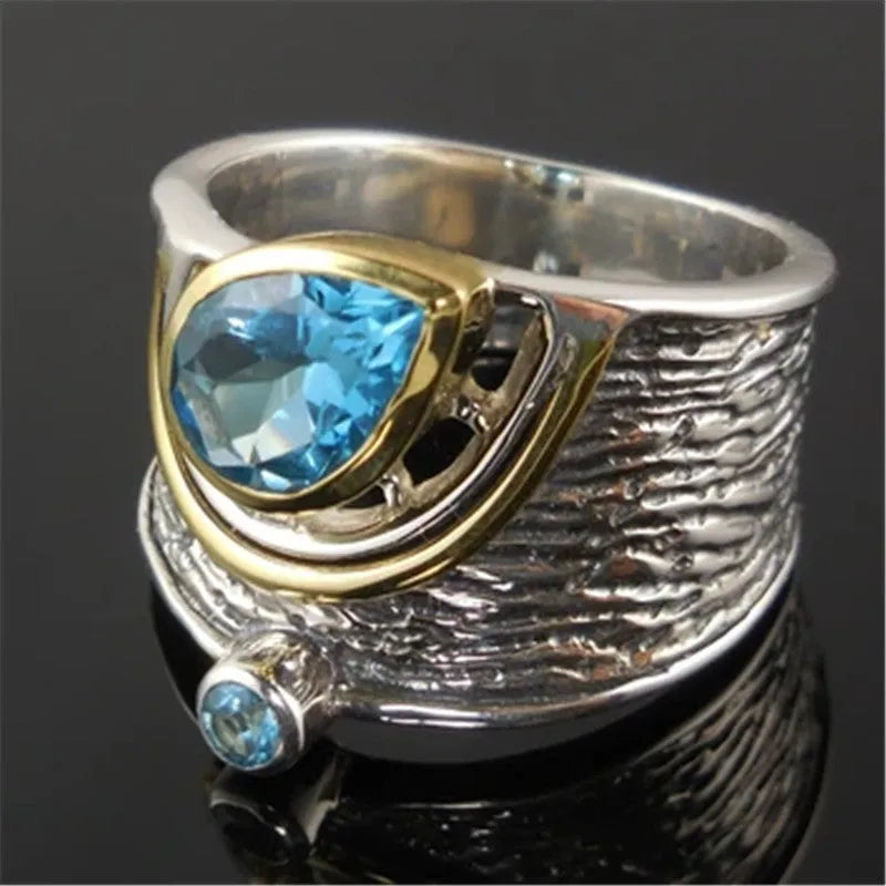 Blue Chinese-style alloy women's ring with inlaid zircon rhinestones in a drop shape.