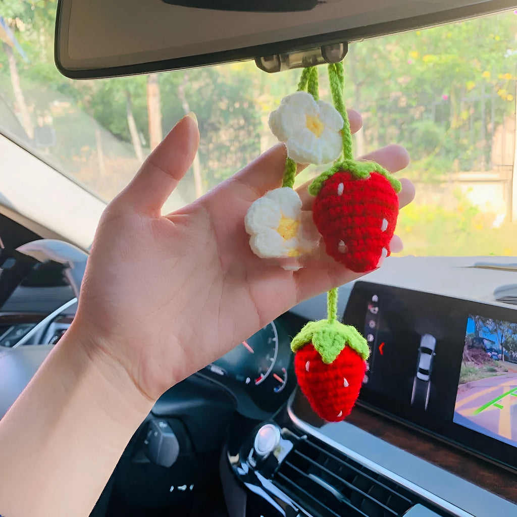 Handmade knitted strawberry shape car pendant made from cotton and hemp.