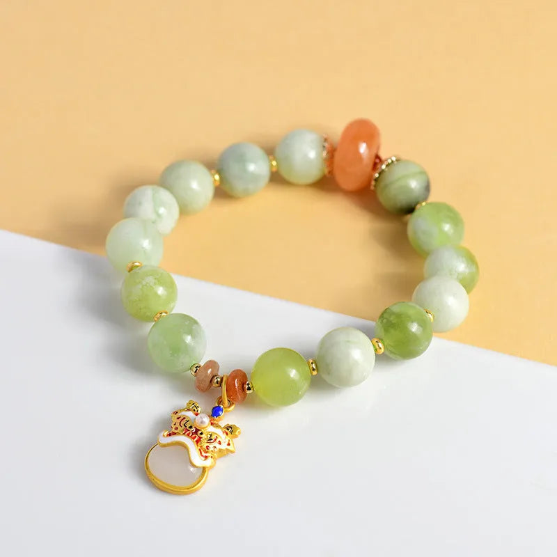 Green milk-in-water xingshi jade geometric pendant bracelet with silver-toned chain