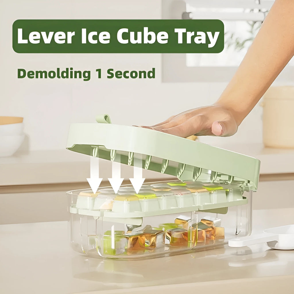 Blue high-capacity ice cube tray with silicone lid and ice scoop stored in its dedicated slot.