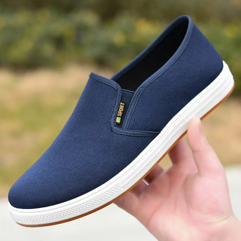 Men's black slip-on canvas cloth shoes with round toe and shallow mouth design