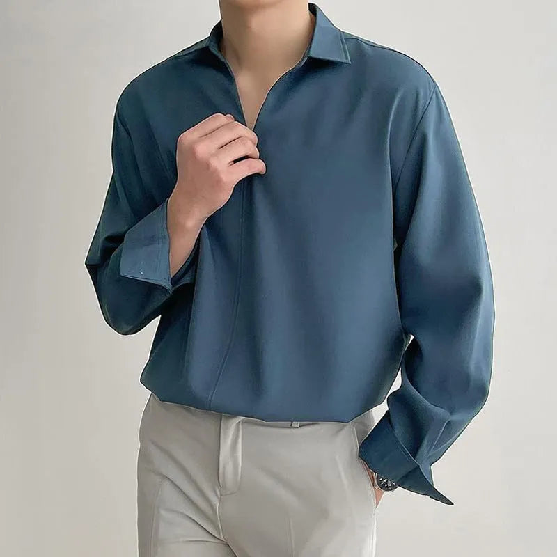 Men's loose lapel casual pullover shirt in solid colour on a hanger, shown in white, black, blue and skin tone options.