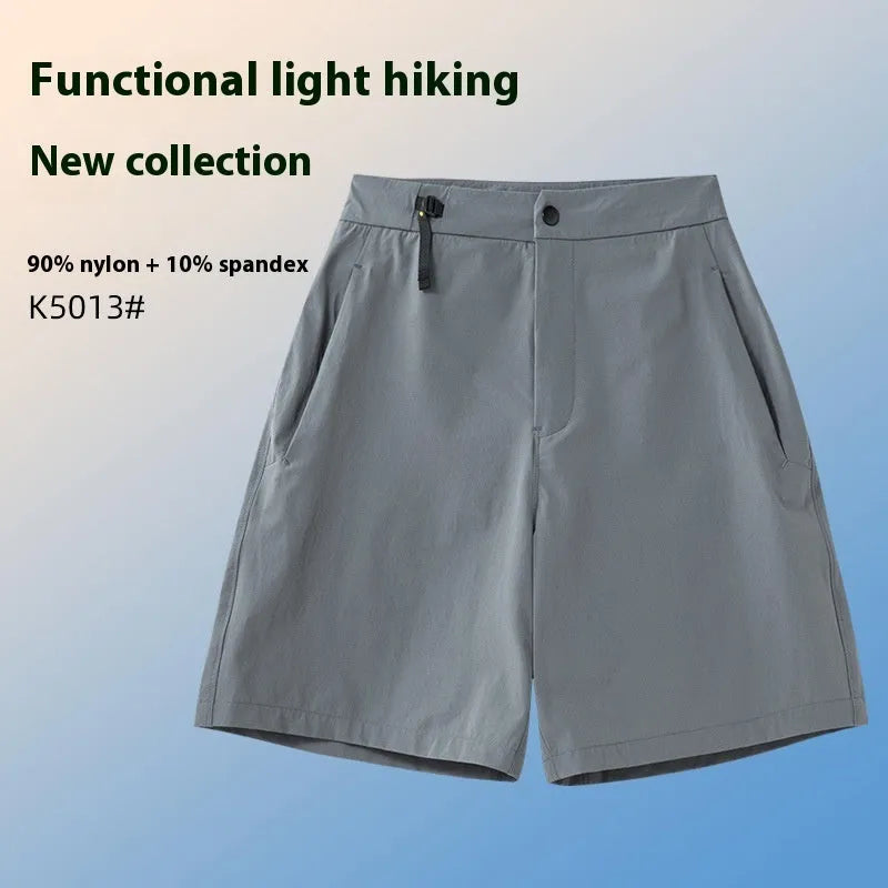 Man wearing khaki 3D cut sports shorts with four-way stretch fabric during a run.