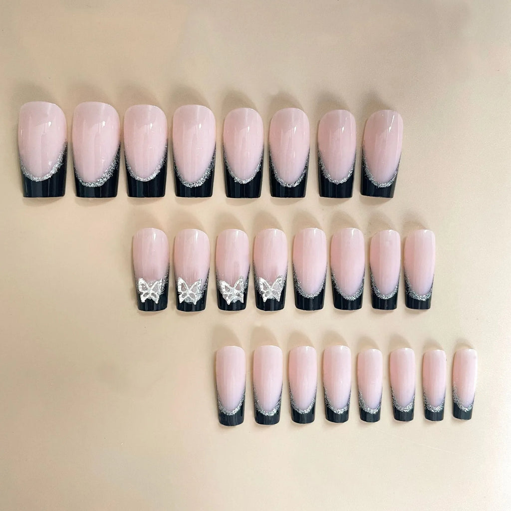 Black French style wear armor nail art set with thin glittering butterfly pattern for cosmetic applications