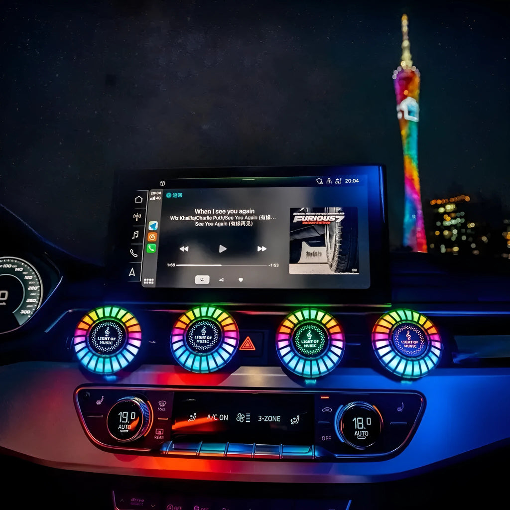 Car air vent-mounted RGB atmosphere light with aromatherapy diffuser in 3D pickup design.