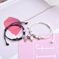 Pair of magnet suction cup bracelets in alloy with electroplated finish, showing seamless clasp and symbolic design.