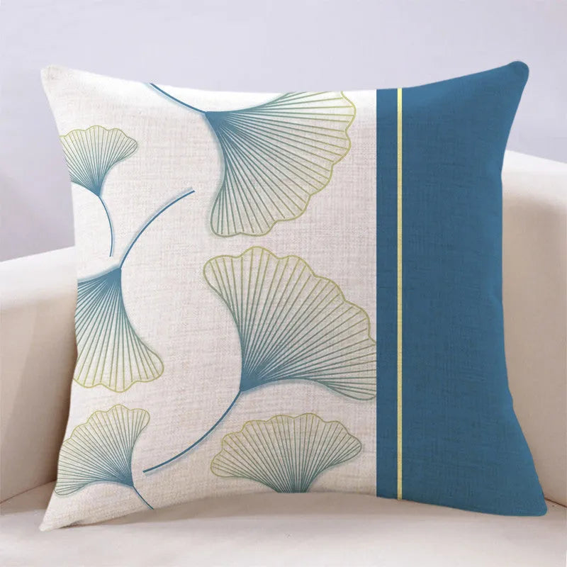Ginkgo leaf printed square cushion cover on a sofa, available in multiple colours and sizes