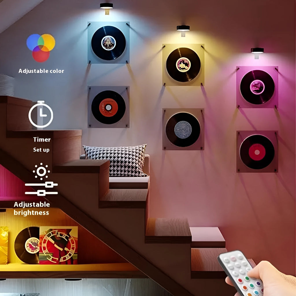 Black magnetic LED painting lamp with remote control on wooden surface