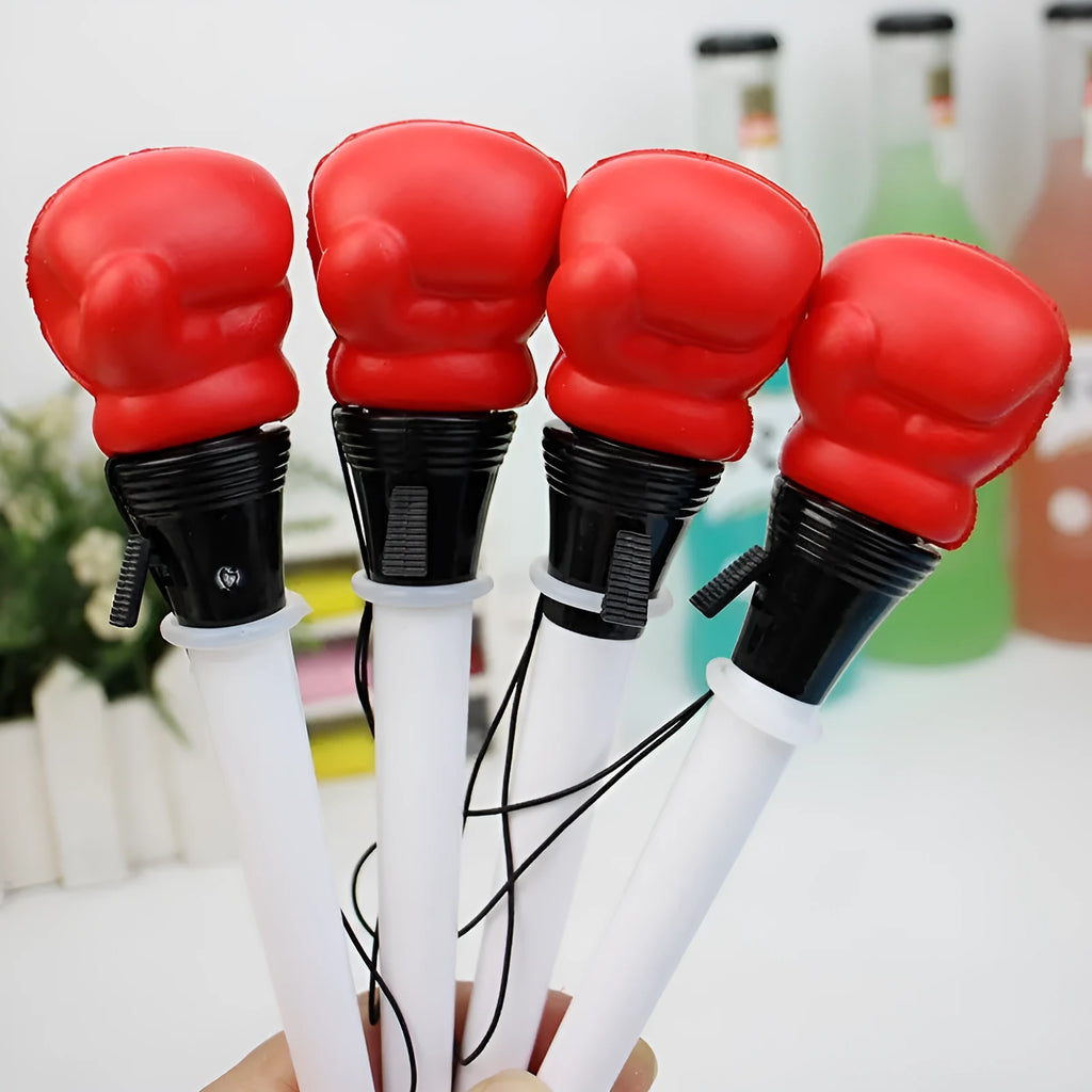 Four boxing press ejection pens with black ink and 0.7mm bullet tips