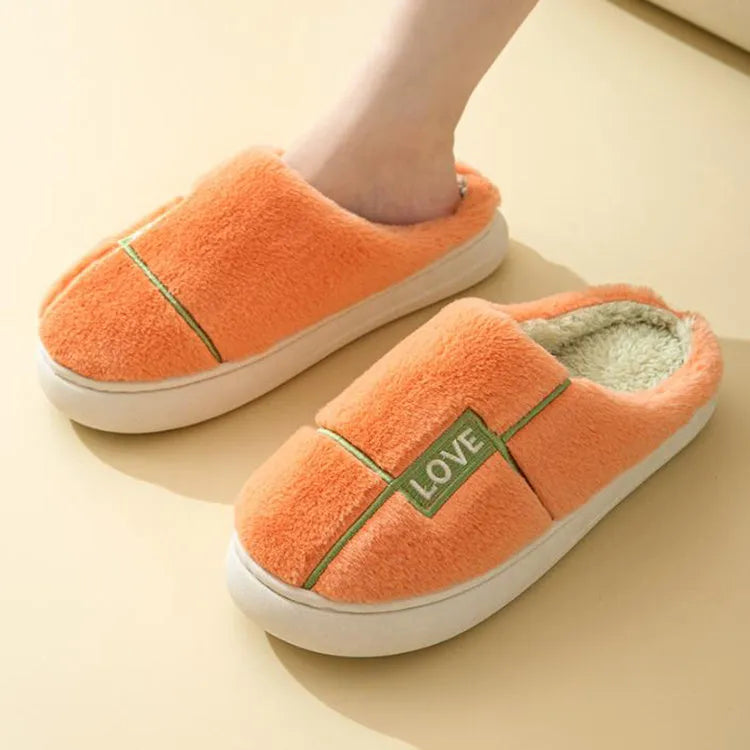 Women's indoor furry slippers in solid colour with plush upper and rubber sole for winter warmth