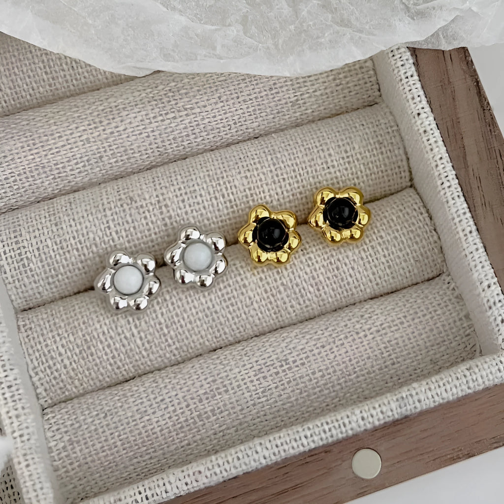 S925 sterling silver black agate flower ear studs in gold colour close up