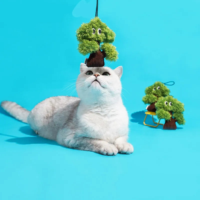 Pine tree shaped plush cat hanging toy with mint filling measuring 10cm by 12cm