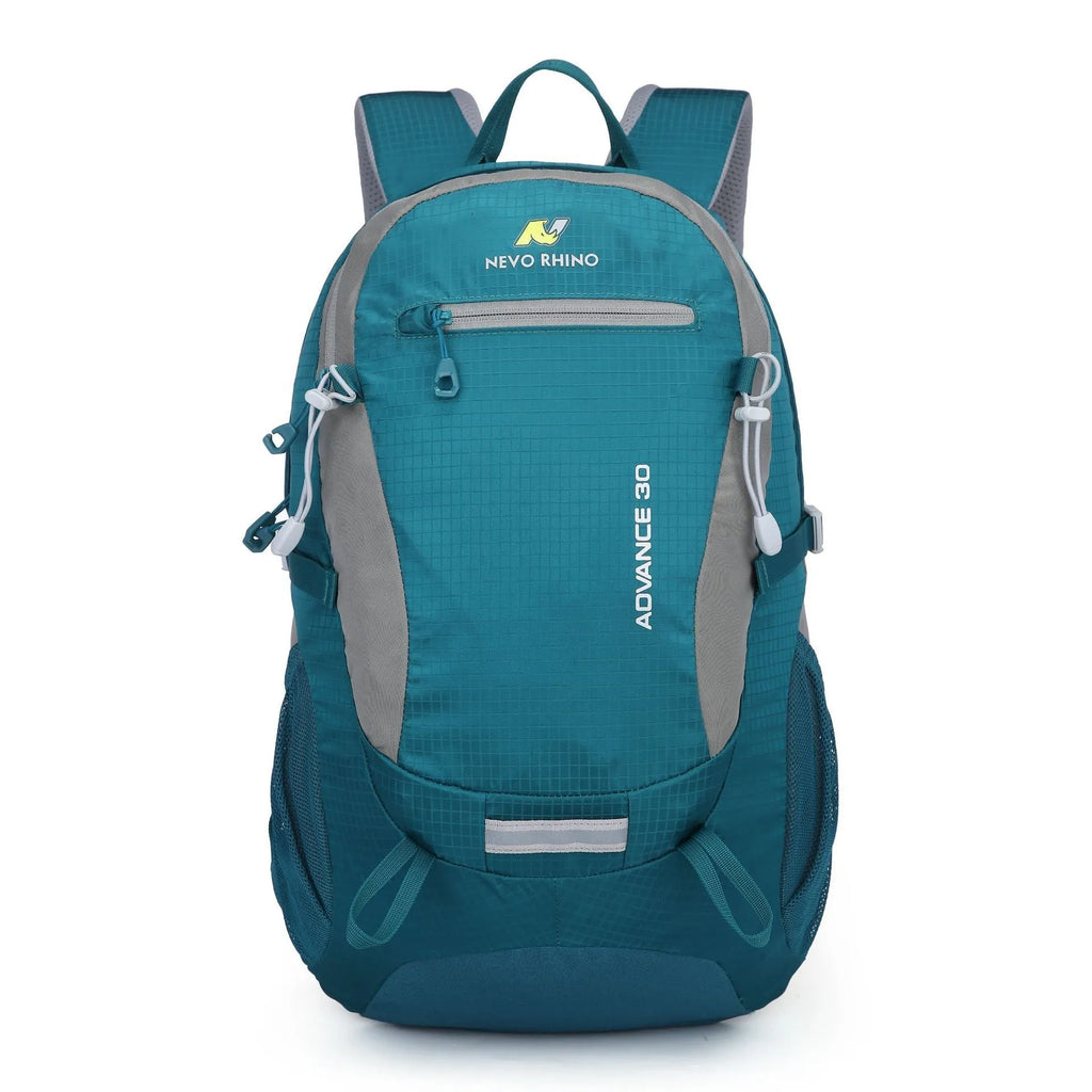 Nylon 30-litre waterproof backpack in dark green with airpillow straps, shown in an outdoor setting.