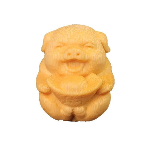 Solid bamboo pig carving ornament measuring 4cm tall with 3.5cm diameter