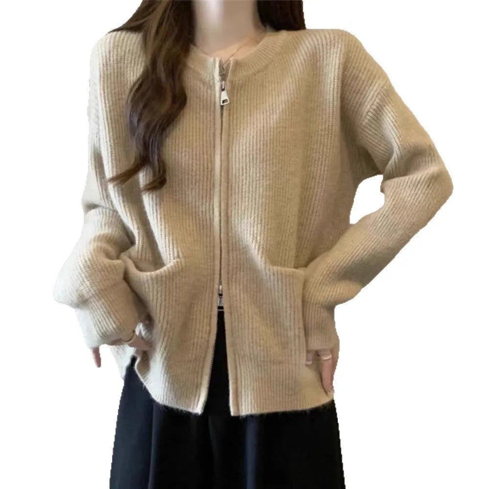 Beige viscose soft sweater coat cardigan with long sleeves on a hanger