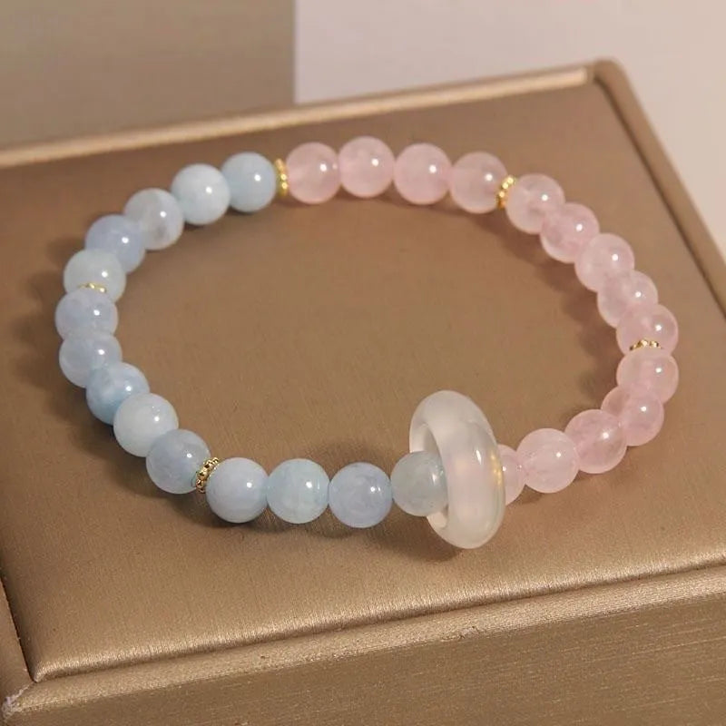 Women's aquamarine crystal bracelet with geometric beads in pink blue colour option