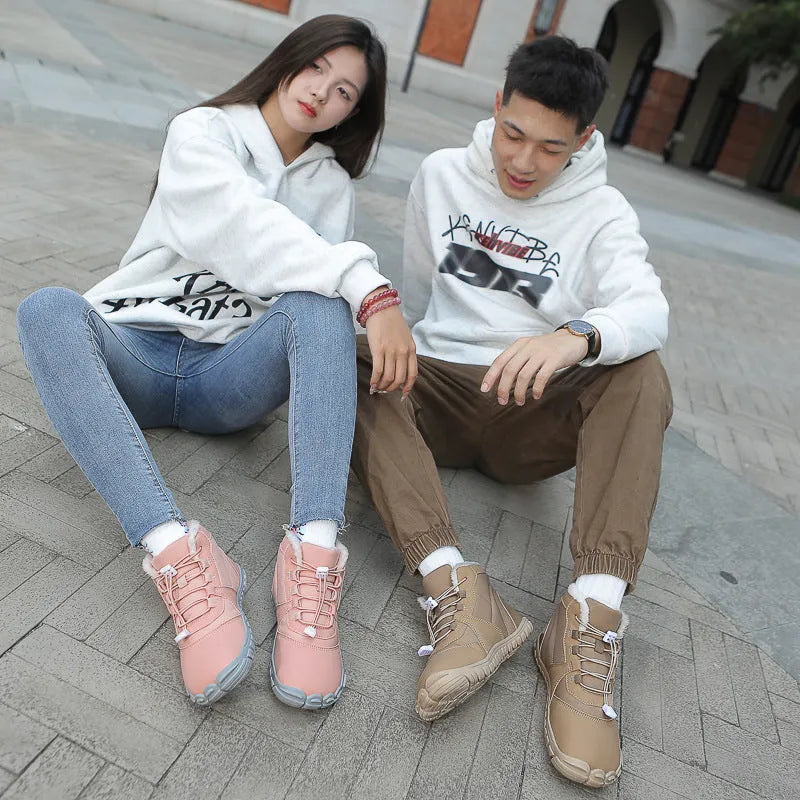 Unisex waterproof snow boots in black, khaki, or pink with round toe, lace-up front, and fleece lining.