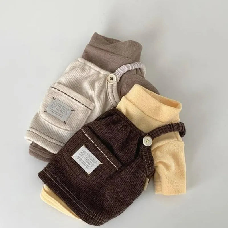 Brown corduroy pet vest with wool Sherpa collar on a small dog, halter design for easy wear