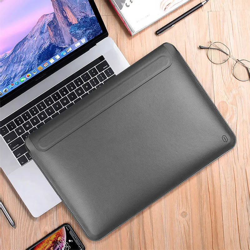 PU leather laptop sleeve bag in dark blue with soft handle and hook and loop closure, sizes 13.3 to 16 inches