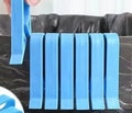 PP plastic non-slip clip for attaching a bin liner to the side of a trash can.