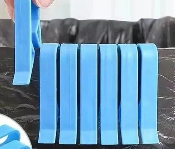 PP plastic non-slip clip for attaching a bin liner to the side of a trash can.