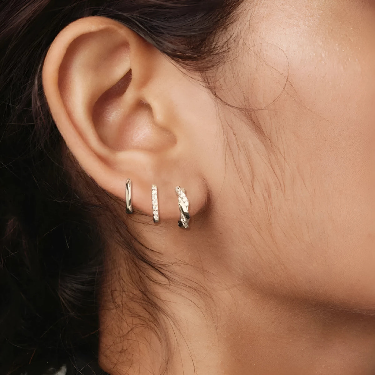 Twist copper earrings with inlaid zircon in gold or silver, shown as a 3-piece or 6-piece set per ear