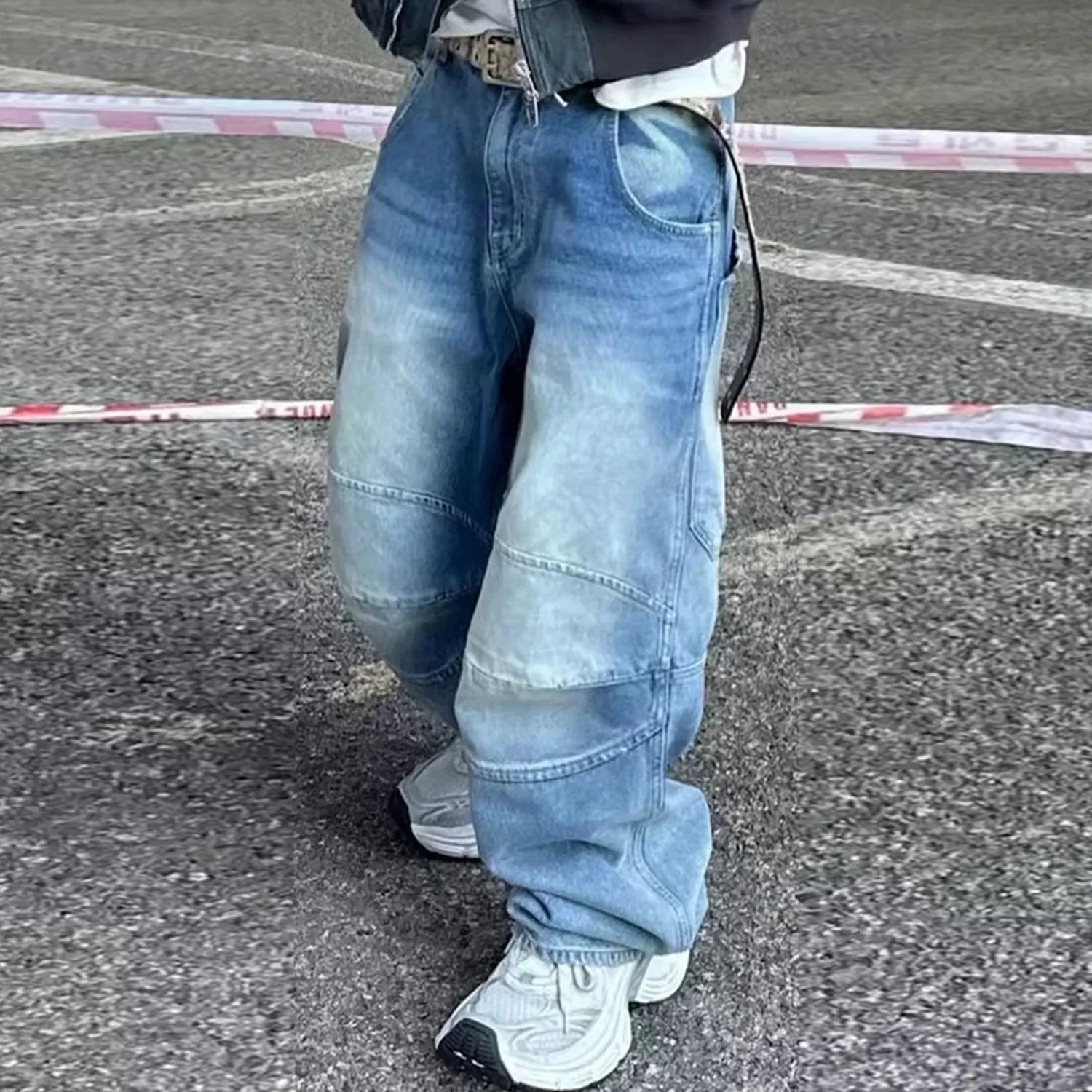 Men's washed white blue baggy straight-leg jeans with zip fly on mannequin