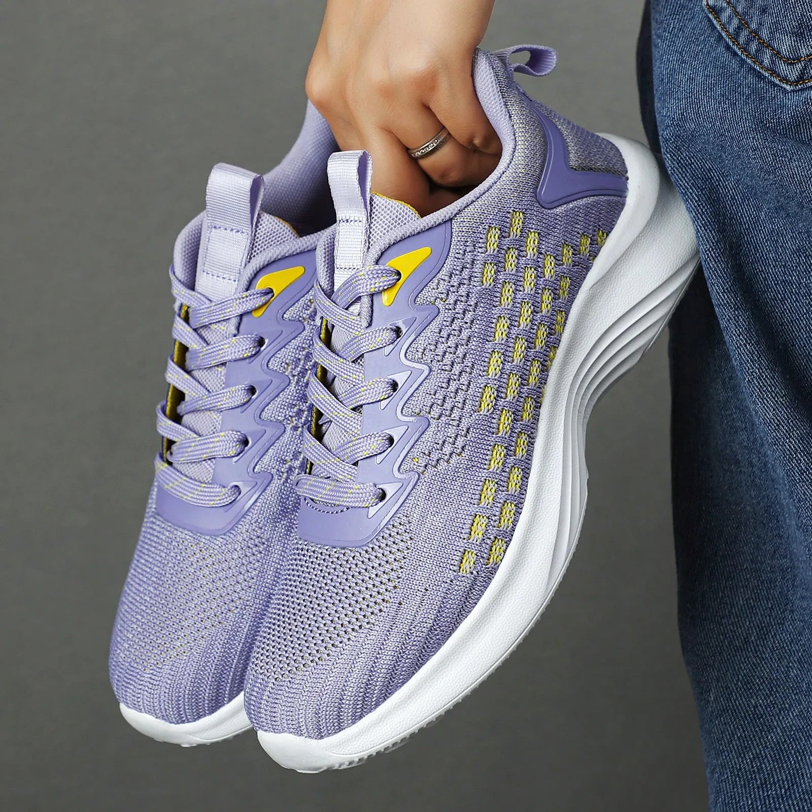 Women's lavender purple Flyknit running shoes with mesh lining and EVA sole