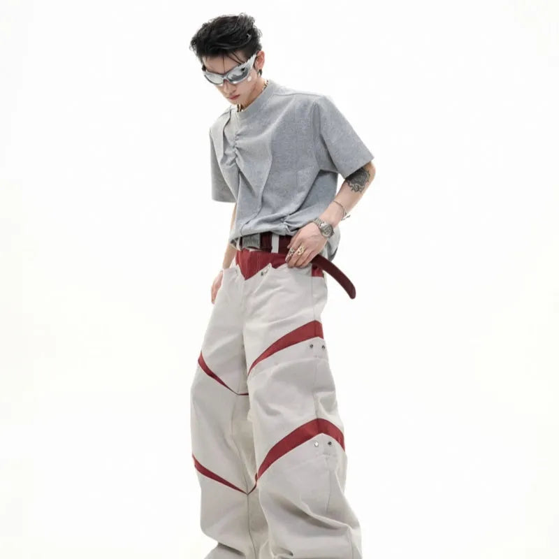 Men's loose-fit grey cotton T-shirt with pleated asymmetric stitching detail on the front, round neck, short sleeves.