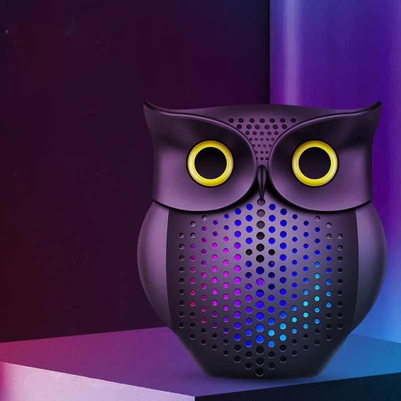 Black wireless Bluetooth speaker with cartoon owl design, compact size