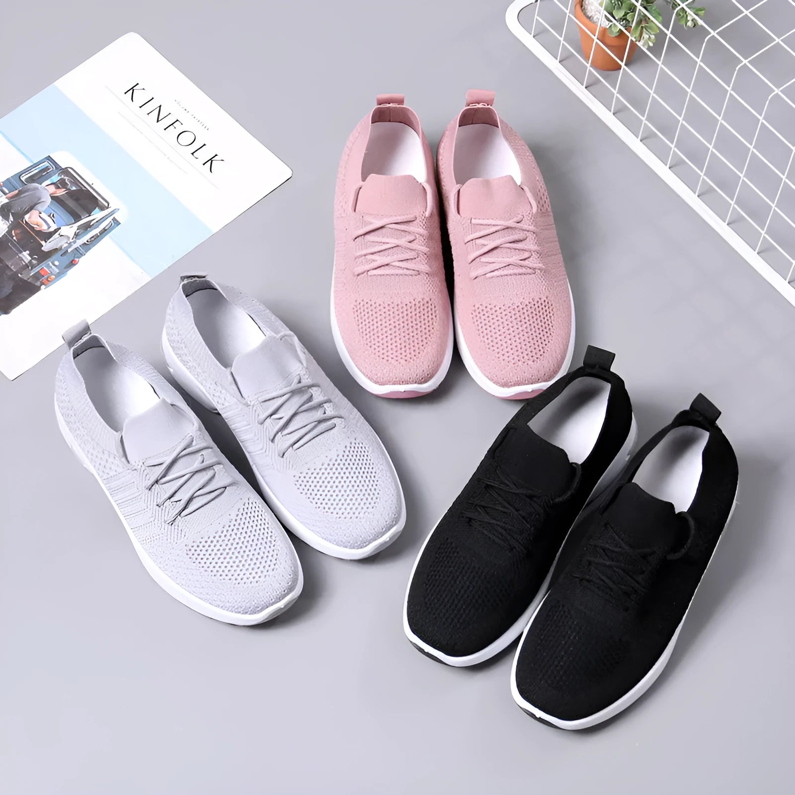 Women's lace-up casual sneaker in grey mesh with a round toe and soft PVC sole.