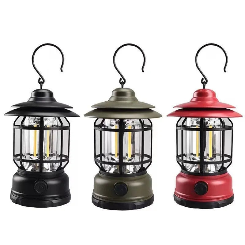 Portable camping lantern in black, red or dark green with dimensions 16.6cm x 6.7cm x 9.6cm