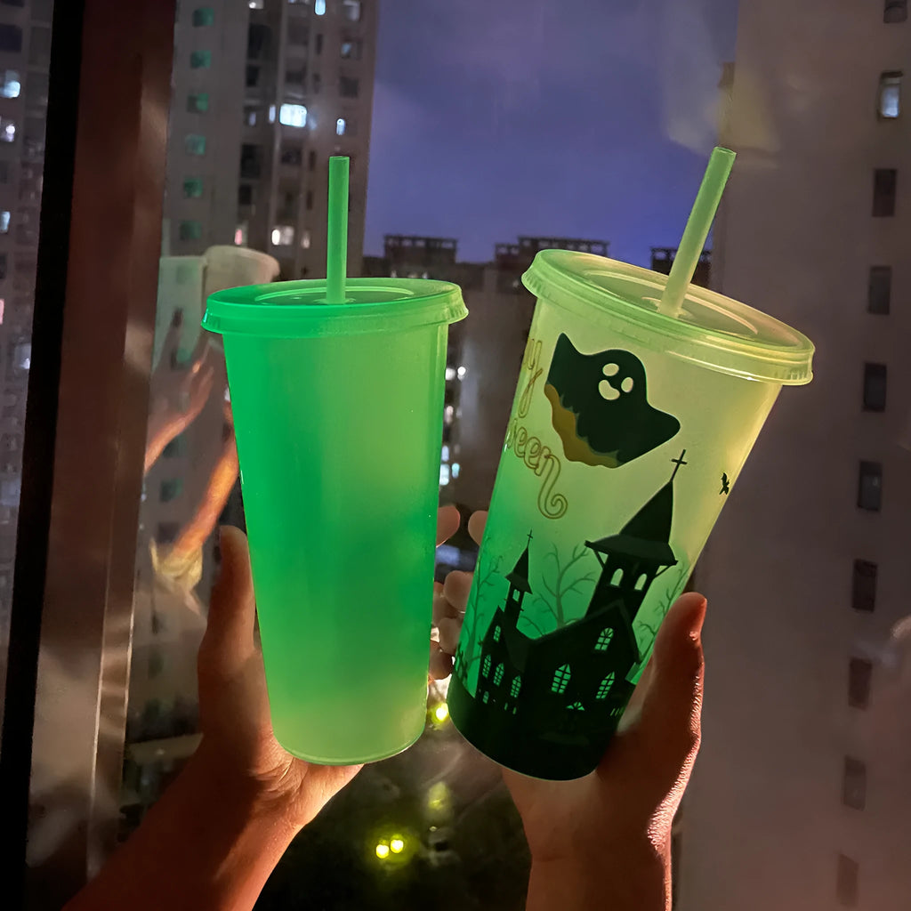 Halloween-themed 720ml plastic sippy cup with luminous straw in assorted colours.